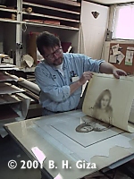 a second plexiglass plate on the pressbed