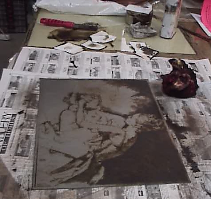 zinc intaglio plate during the inking process