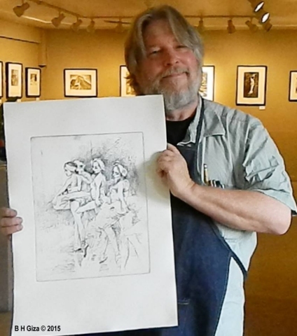 Artist holding Line of Swans